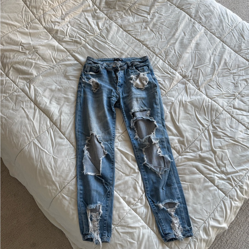Distressed Blue Jeans